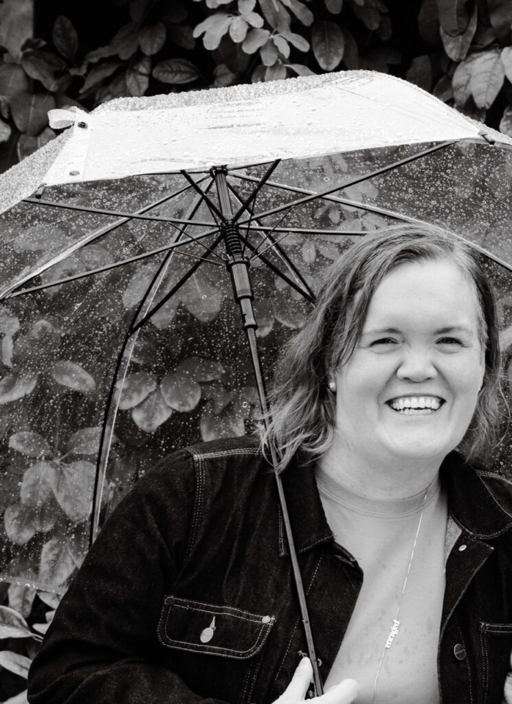 Carrie under an umbrella in Seattle